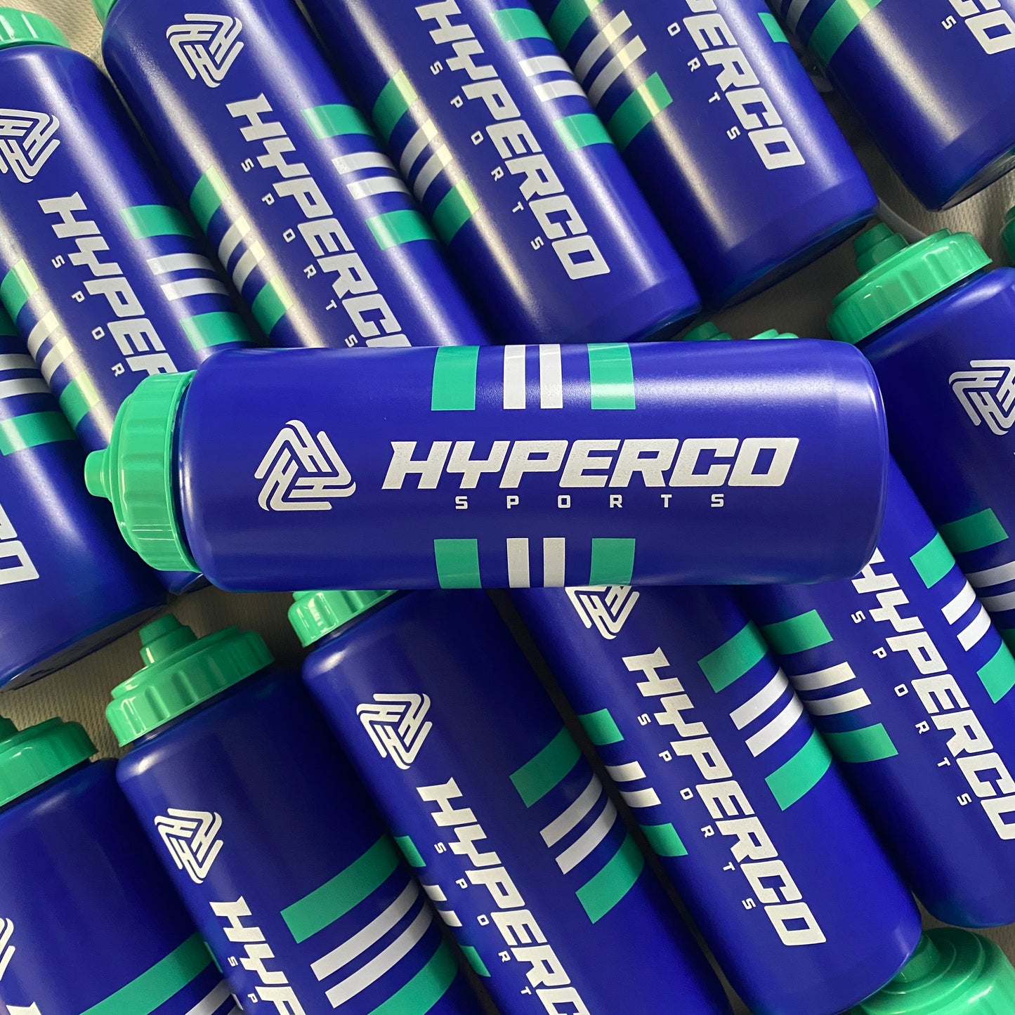 Hyperco Sports squeeze valve water bottle in blue and green