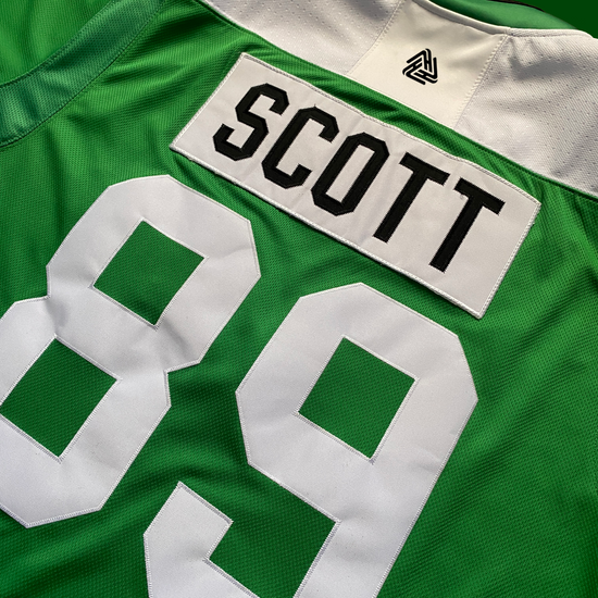 Embroidered nameplate on custom hockey jersey by Hyperco Sports